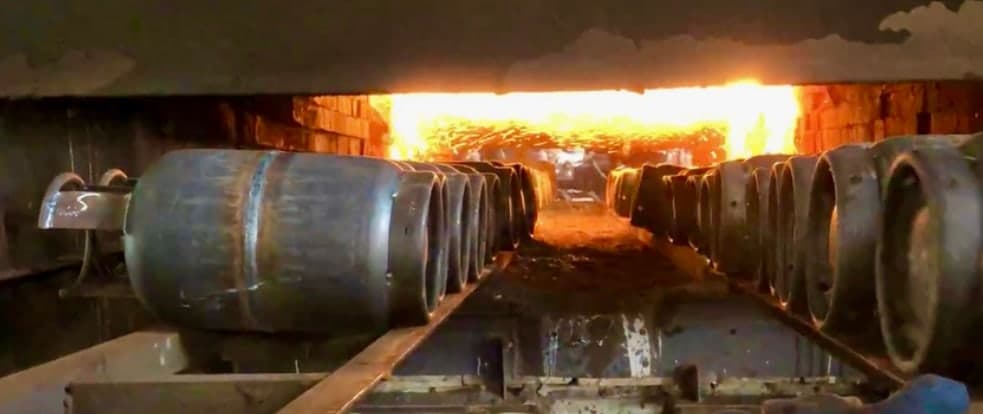 Welded cylinder shells entering the heat treatment furnace